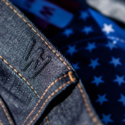 @winnowstudios details W logo on waistband of Williamsburg raw jeans