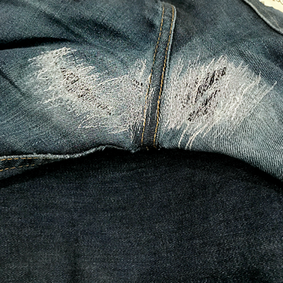 Final photo of jeans with crotch blow-out repaired